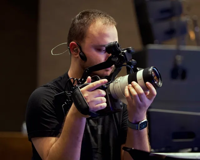 Looking through the viewfinder on set