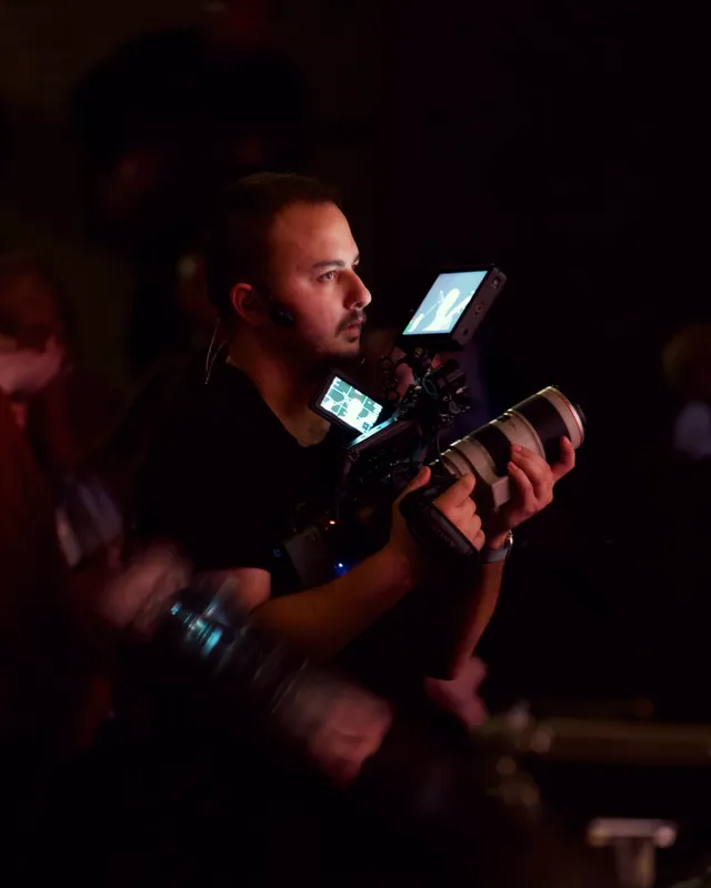 Low-light camera work in the crowd